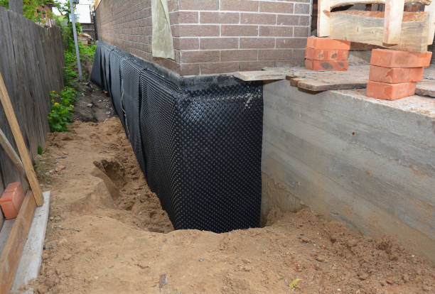 Happy homeowners after waterproofing job in Hanover